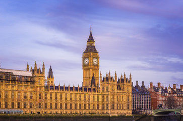 The Big Ben, the Houses of Parliament and Westminster Bridge at sunrise with beautiful sky - London, UK
