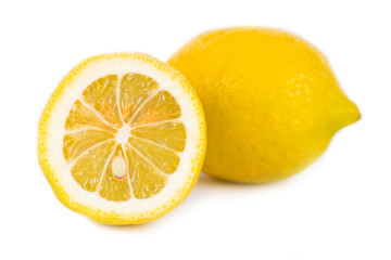 Cut lemon on white background