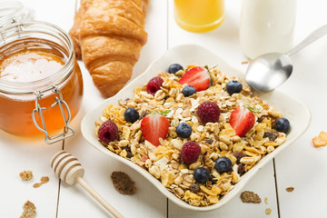 Light, delicious breakfast with cereal and fruit.