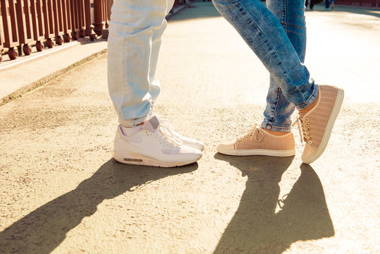 Closeup photo of couple in love on the bridge standing together