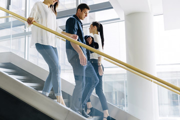 Group of businessman walking and taking stairs