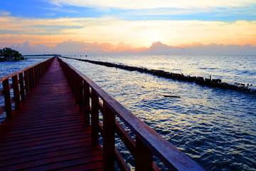 Fototapeta premium sunrise at red bridge Bangkhuntain seashore,Bangkok, Thailand.