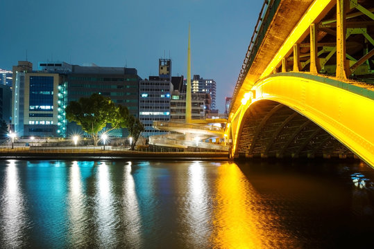 Bridge And Buildings Along Yodo River