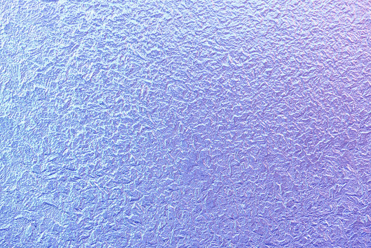 Frost patterns on window glass in winter. Frosted Glass Texture. Blue Purple