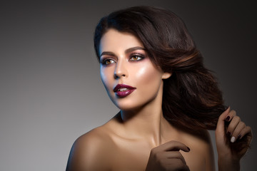 Beautiful model woman in beauty salon makeup Young modern girl i