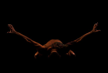 young man doing yoga and gymnastics, fitness