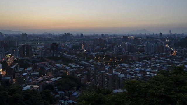 4K timelapse of aerial sunset to twilight view of JingMei, Taiwan