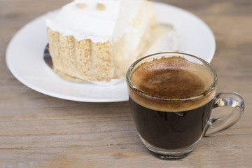Shot of espresso on wood