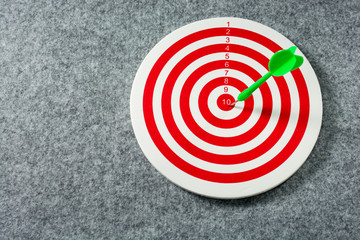 Green darts arrows in the target center. Success hitting target