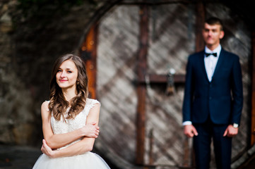 Married couple stay near old big barrel