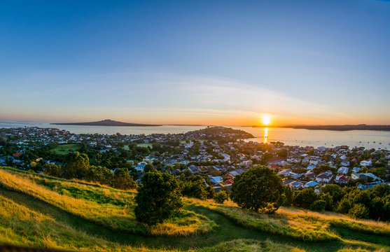 Beautiful sunrise over the Hauraki Gulf..Elevated view from mount Victoria.