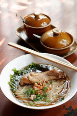 Rice noodle soup with stewed chicken and chinese herbs