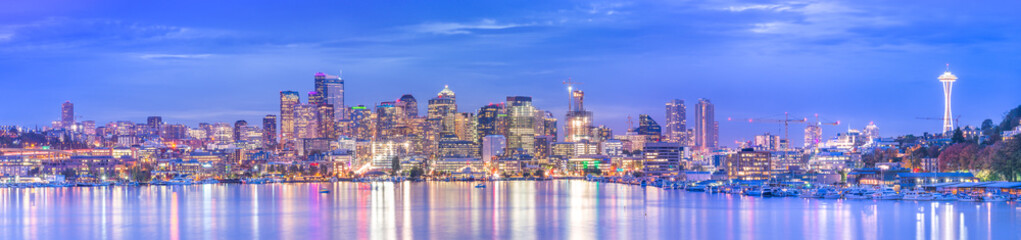 Fototapeta na wymiar scenic view of Seattle cityscape in the night time with reflection in the water,Washington,usa.