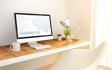minimalist workplace with neuromarketing computer