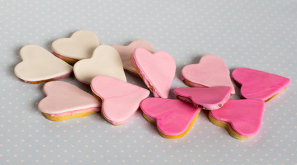 Pink cookies, heart shape, blue background - 101205722