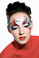 woman with red body and  perfect  creative make-up