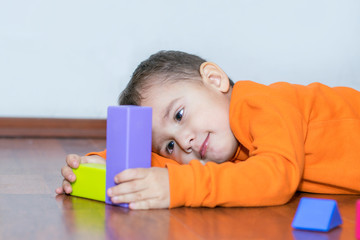 boy playing with figurines