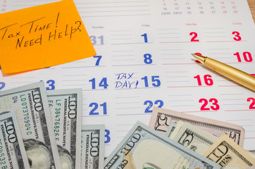 Tax Time! calendar with dollar and pen