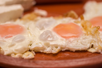 Hot dogs cheese yogurt and eggs served for breakfast