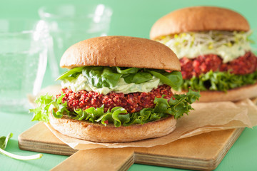veggie beet and quinoa burger with avocado dressing