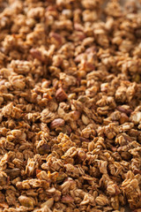 homemade healthy granola on backing paper background