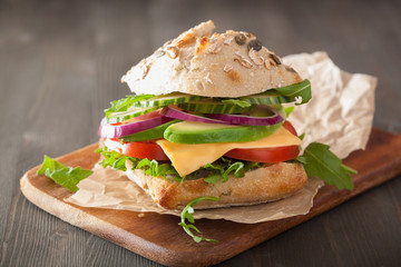 tomato avocado cheese sandwich with cucumber onion