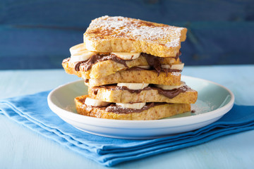 french toasts with banana chocolate sauce and caramel for breakf
