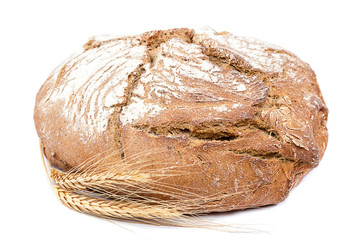 Fresh rye bread with wheat ears.
