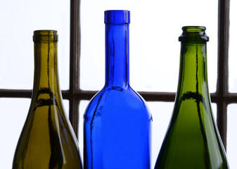 Three Empty Wine Bottles