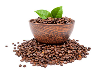 Coffee beans with green leaves in pottery