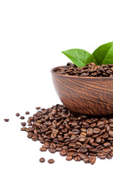 Coffee beans with green leaves