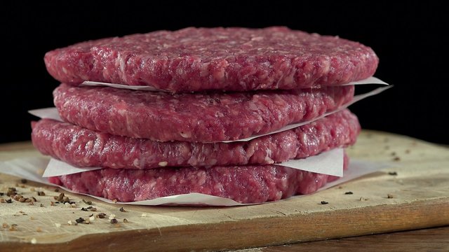 Raw Burger Meat (pure beef) as not loopable rotating 4K footage
