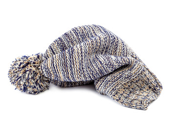 Winter colorful knitted cap on a white