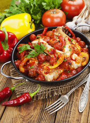Chicken in a sauce of tomato and pepper