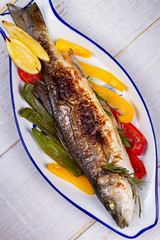 Seabuss with Vegetables, Lemon and Rosemary
