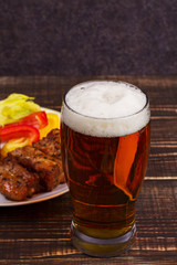 Glass of Beer, Pork Ribs and Vegetables