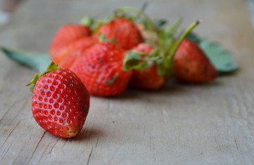 strawberry on wooden board