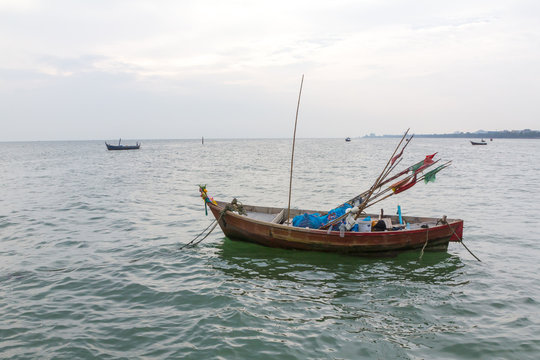 small boat fishing on bang san beach chonburi, Thailand