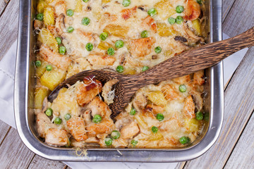 Creamy Chicken, Potato  and Mushrooms Casserole. View from above, top studio shot