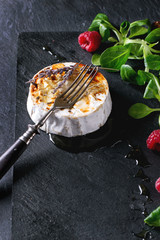 Baked Goat cheese with honey and raspberries