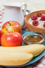 Breakfast with Bircher Muesli, Fruits, Honey and Milk 