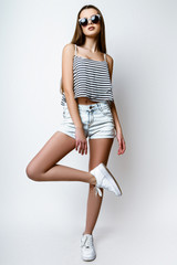 Studio photo of young  woman on white background.