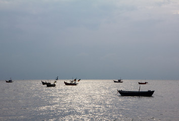landscape small boat on sea and sunlight reflect sea