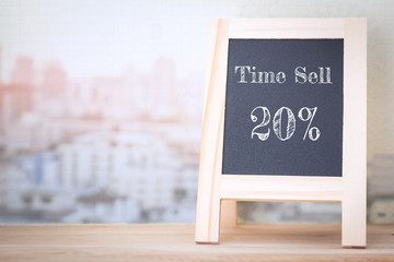 Concept Time Sell 20%  message on wood boards