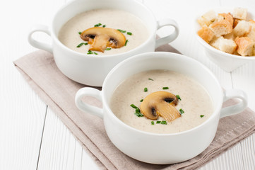 Two bowls of  mushroom cream soup