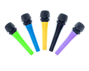 Color Microphones isolated on the white background. Speaker concept.