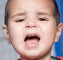 closeup of brown-eyed child