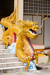 a big dragon statue at thailand,chinese temple.