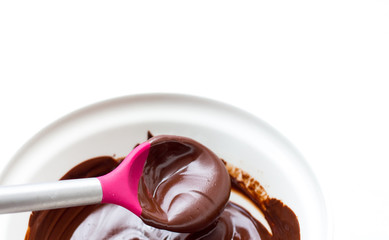 chocolate mix in a pink spoon 