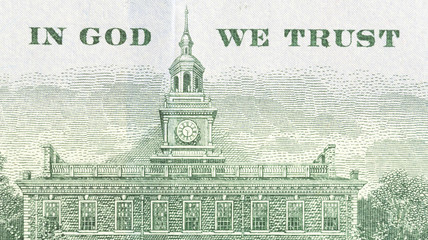 In God We Trust plus Independence Hall on the back of a US hundred dollar bill. - obrazy, fototapety, plakaty